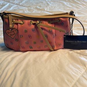 Dooney & Bourke tassel top zip bubble gum purse